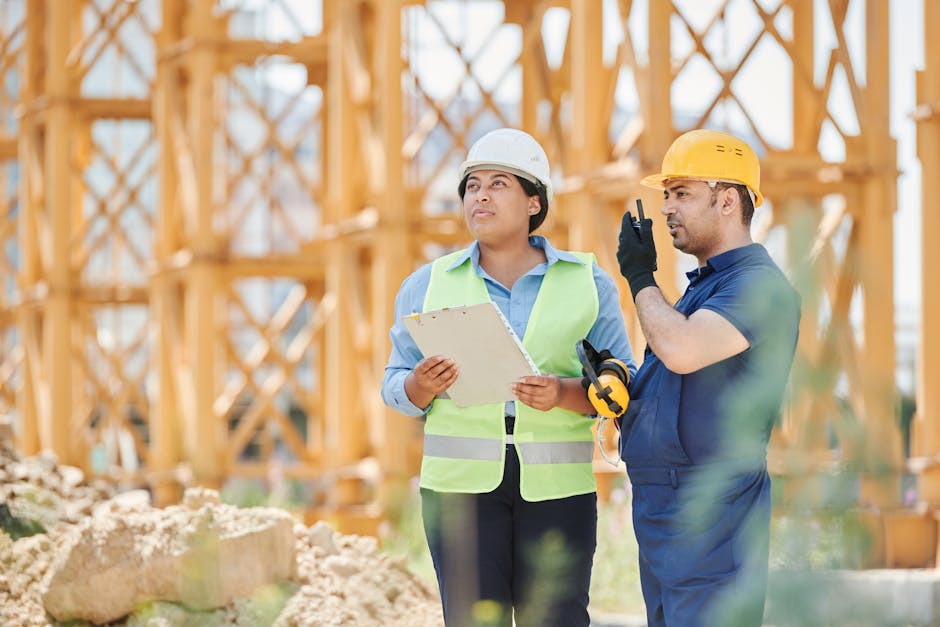 Professional construction team with safety equipment on roofing project